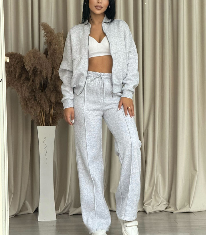 Eleganta Skräddarsydd Utstyrsel Med Dragkedja Topp Och Matchande Byxor För Kvinnor